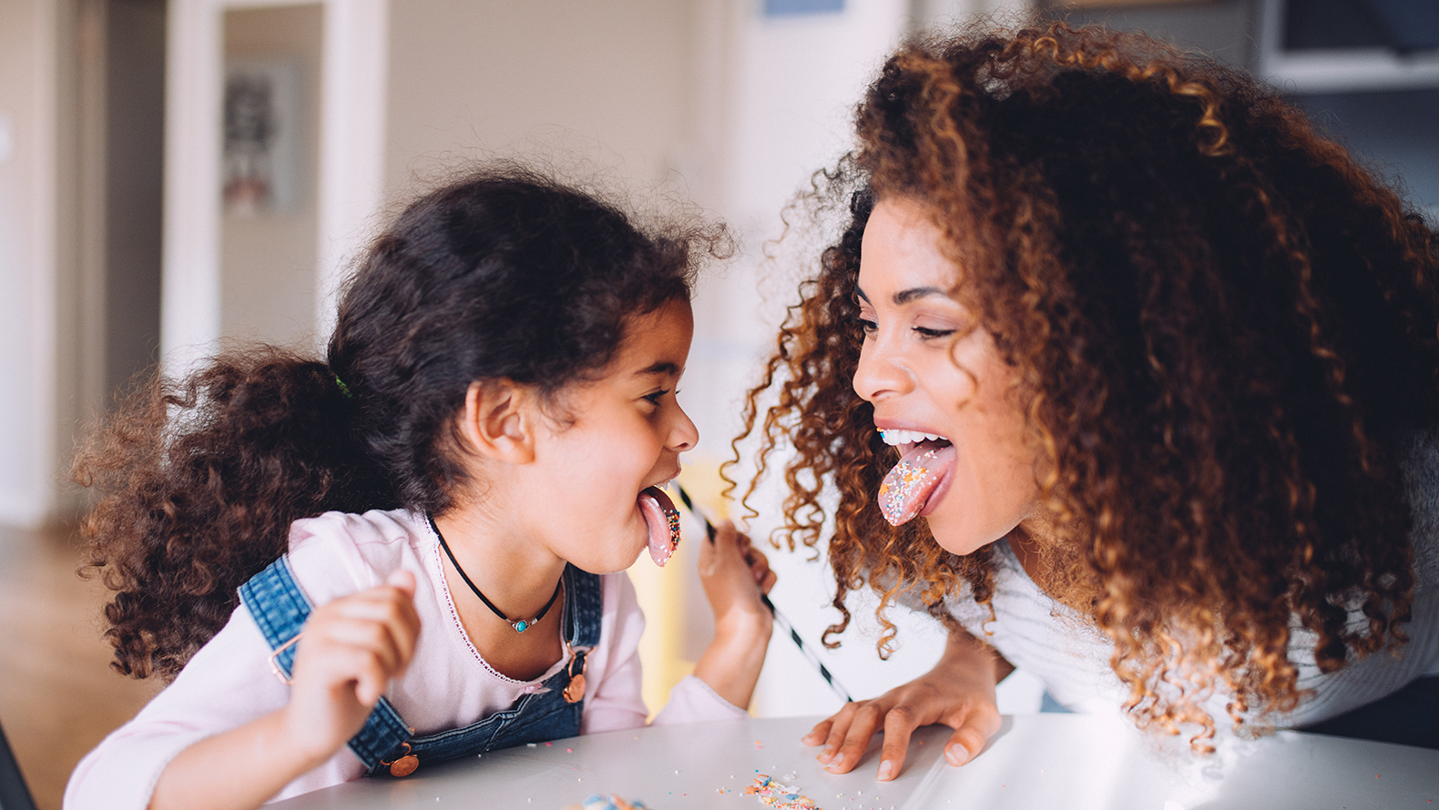 Young girl and mom have fun baking